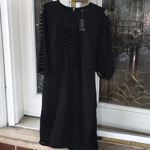 Open cage sleeve dress. Sexy